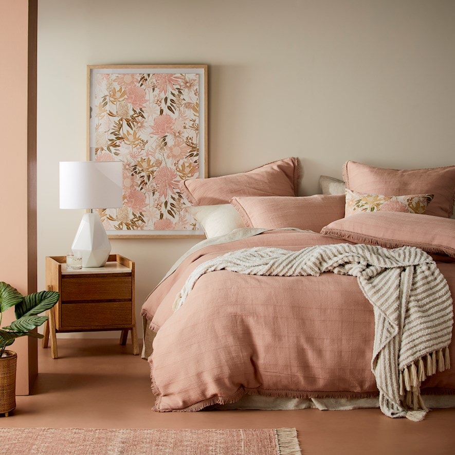 cosy modern bedroom with warm soft furnishings